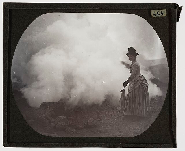 Woman watching a volcano in Sicily