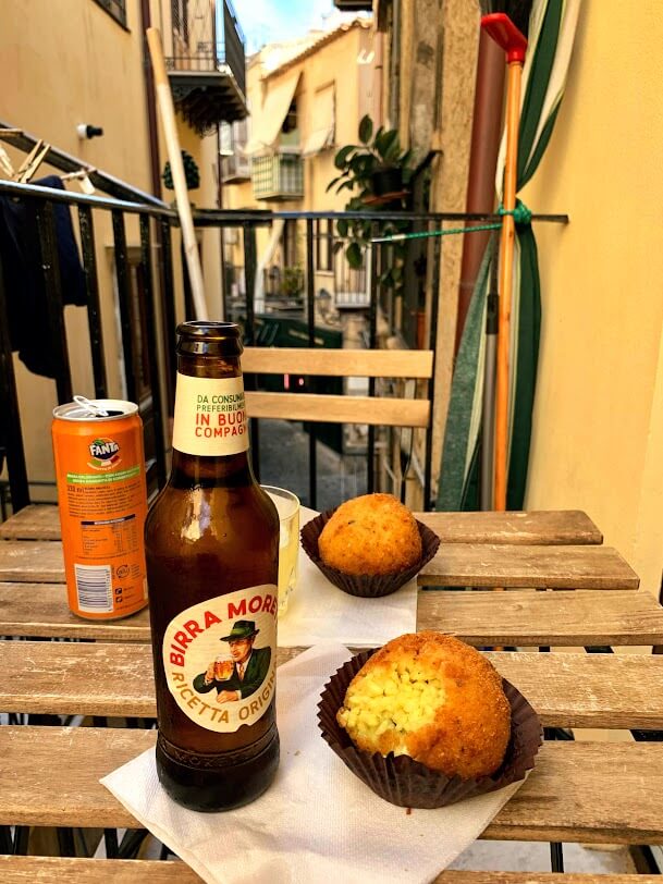 Aranci and beer in Cefalu, Sicily Aranci and beer in Cefalu, Sicily