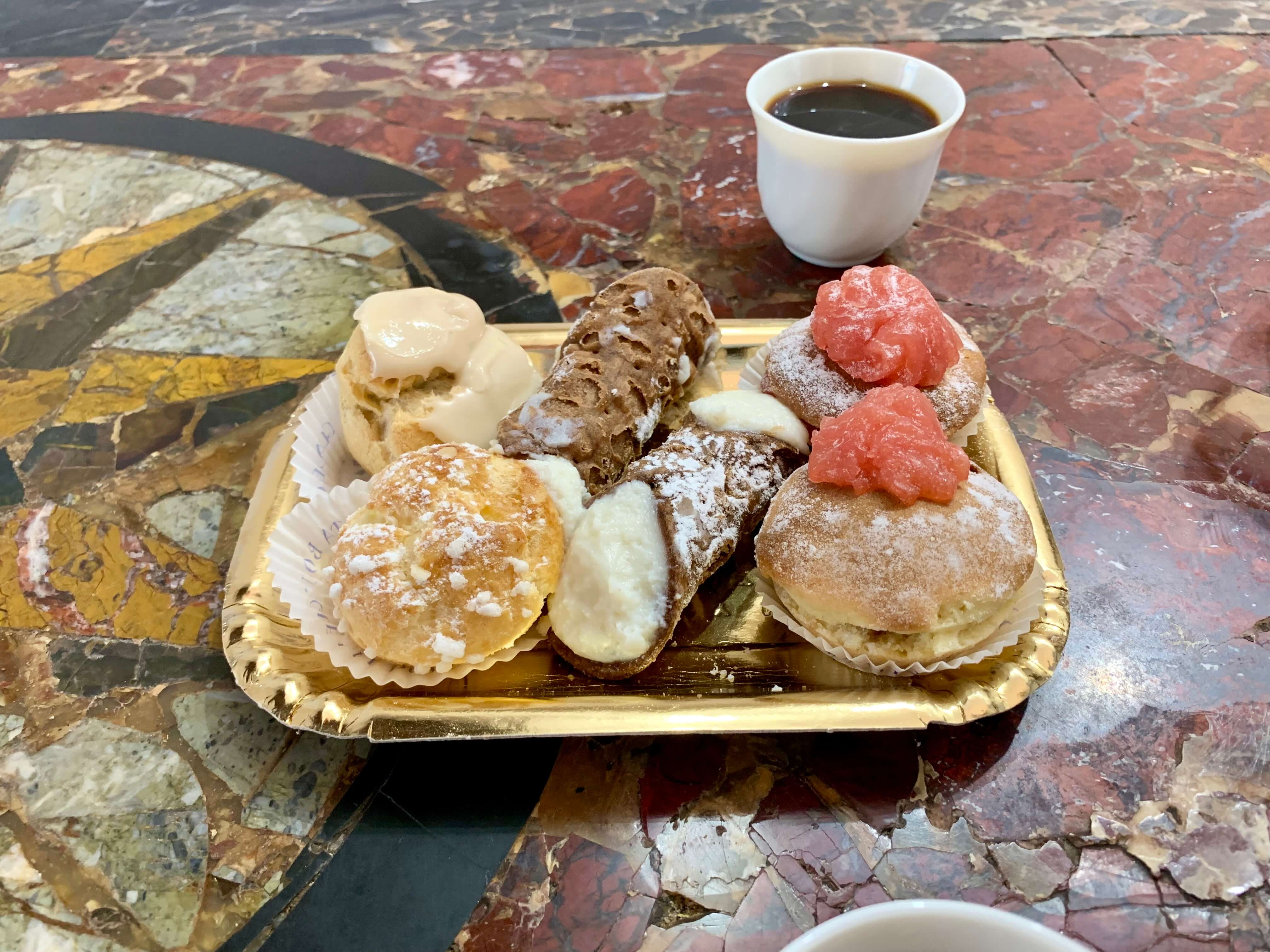 Typical Sicilian pastry, including cannoli.