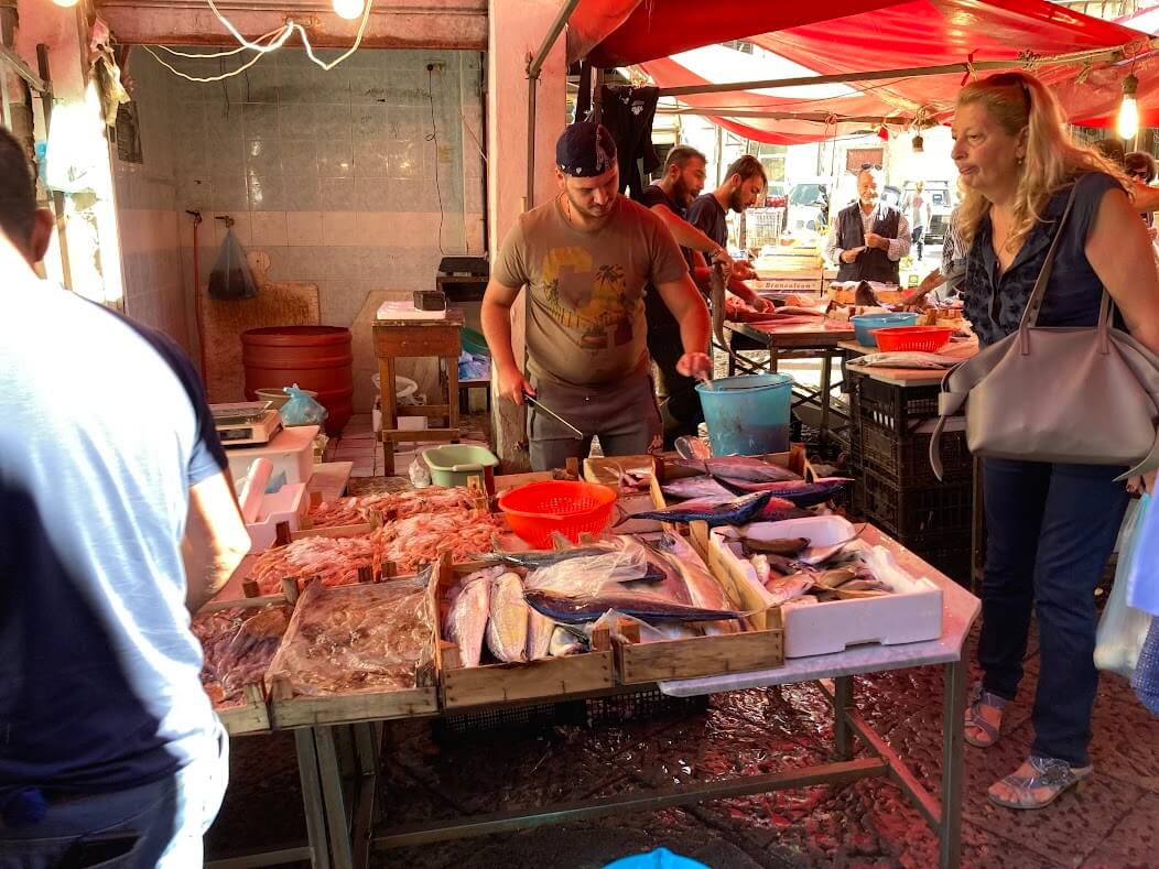 Fish seller at Ballaro Market in Palermo, Sicily
