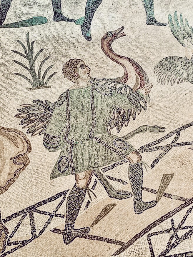 Man Carrying an Ostrich Mosaic in Villa Romana del Casale